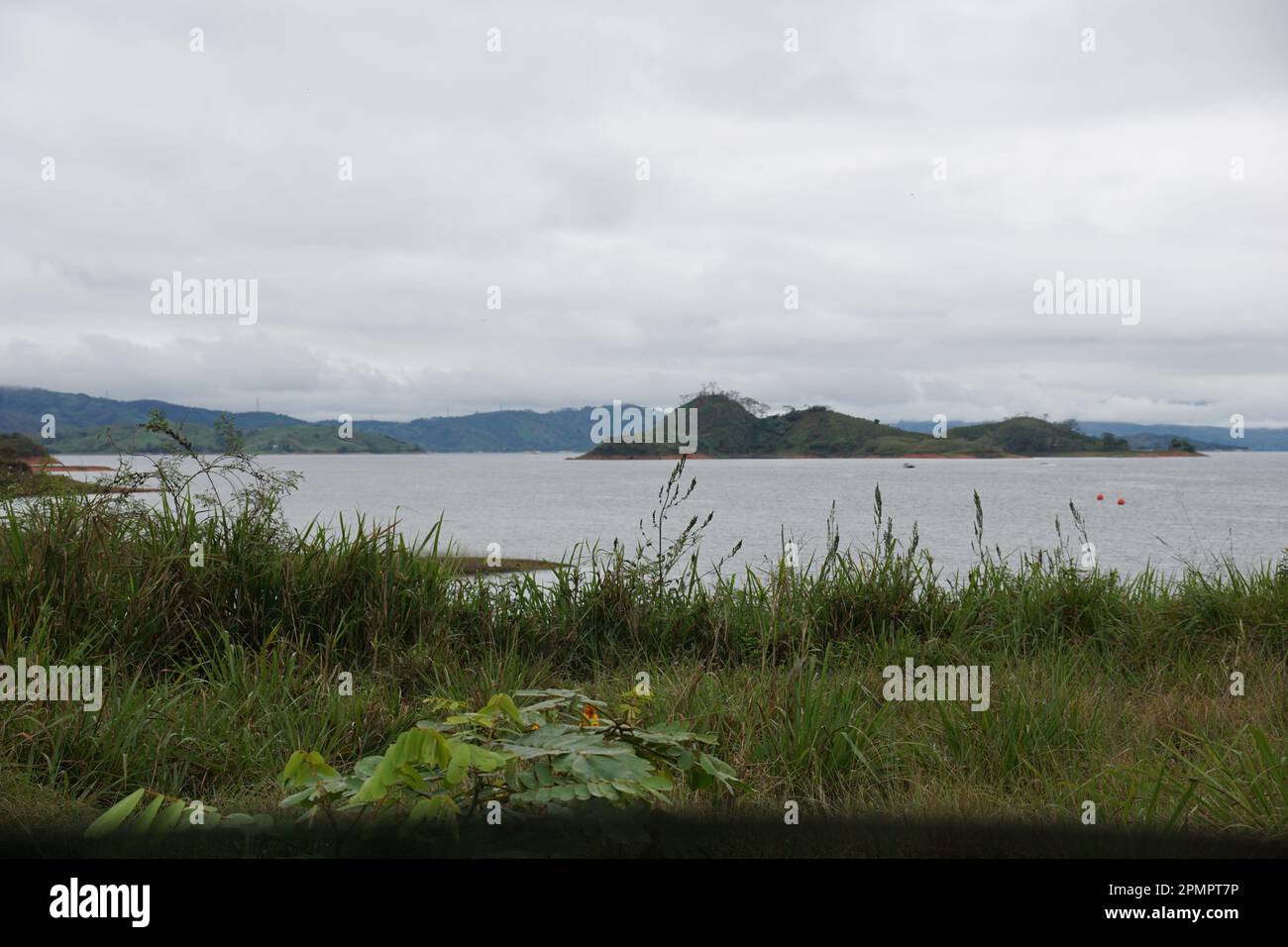 Grass, lake, mountain at chiapas, mexico Stock Photo