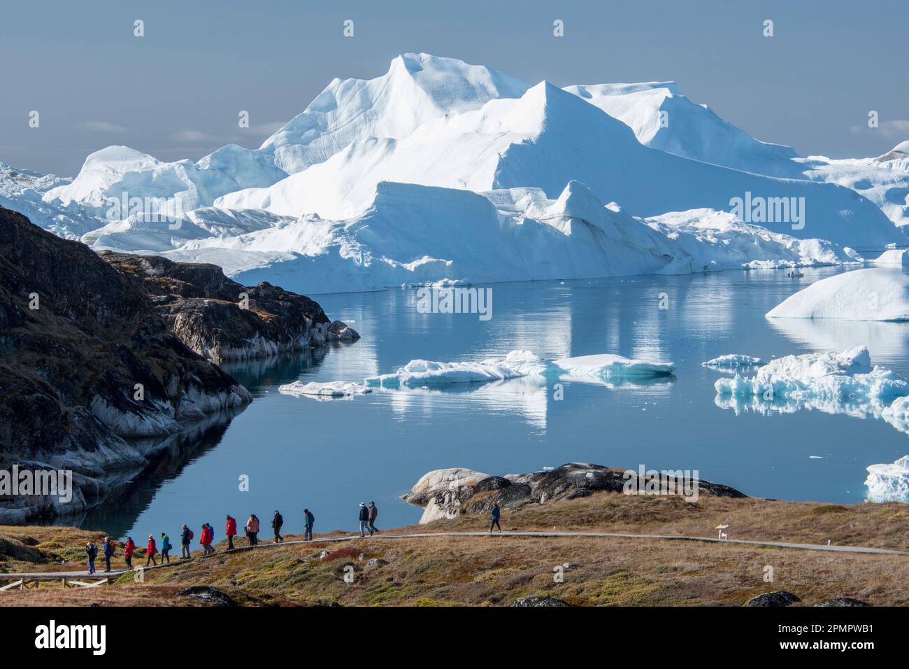 The boardwalk to an overlook to view the icebergs of Sermeq Kujalleq glacier and Disko Bay. Stock Photo