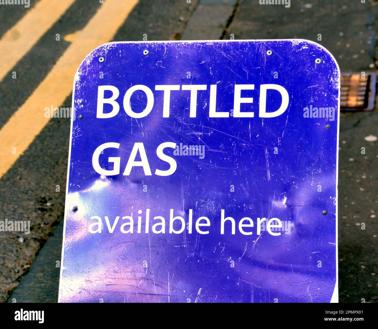 bottled gas available here sign Stock Photo Alamy