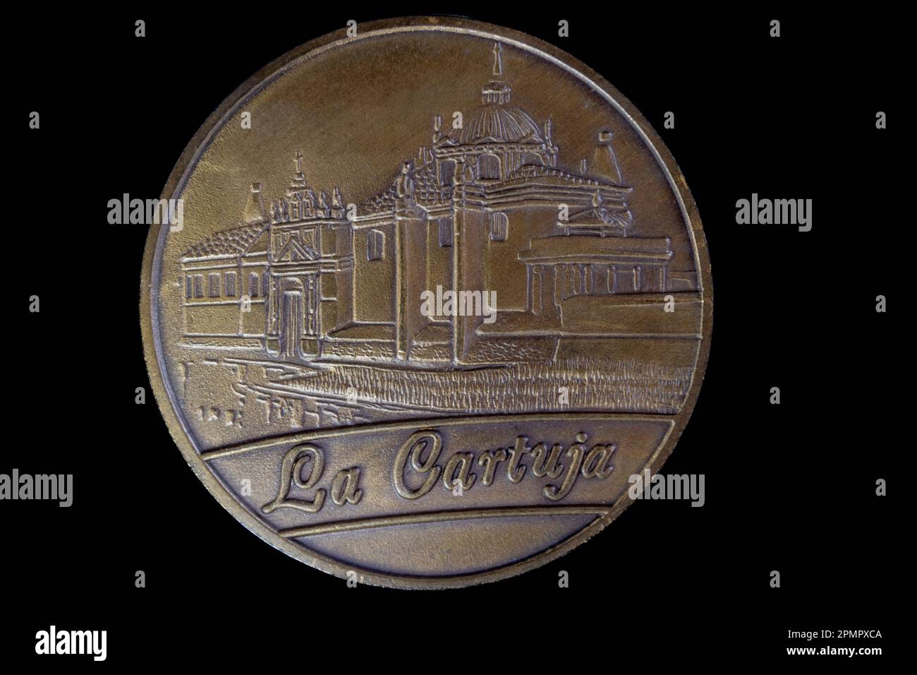 Palafolls, Barcelona, Spain; 04 15 2023: Charterhouse, copper coin an engraved of La Cartuja ,Seville Stock Photo