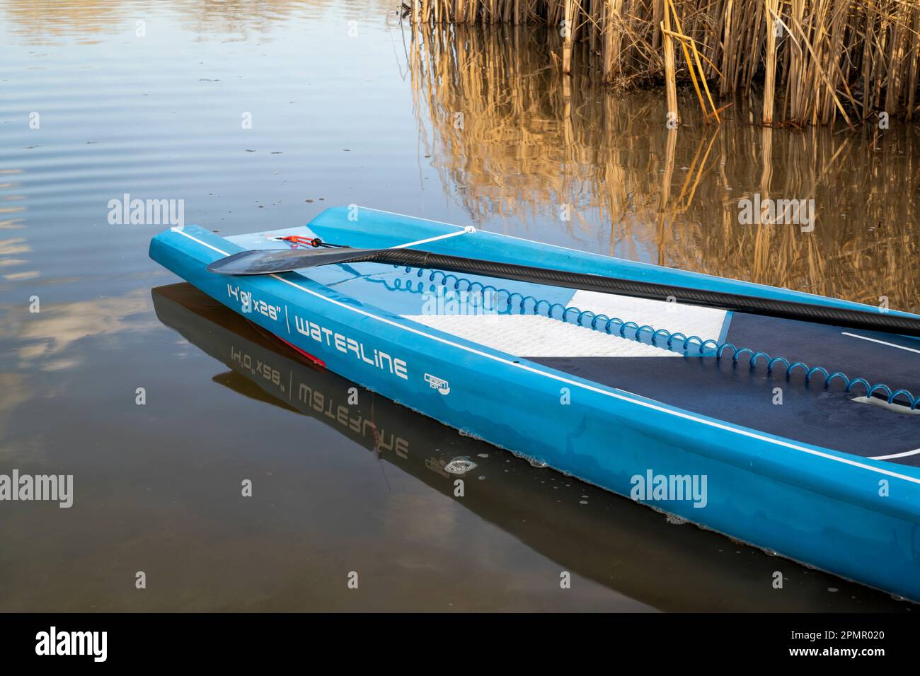 Fort Collins, CO, USA - March 30, 2023: Tail of a touring stand up paddleboard designed for flatwater (2023 Waterline model by Starboard) on a lake sh Stock Photo