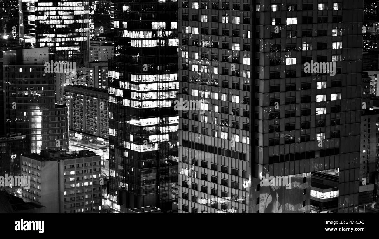 View of at night glass buildings and modern business skyscrapers,. View ...