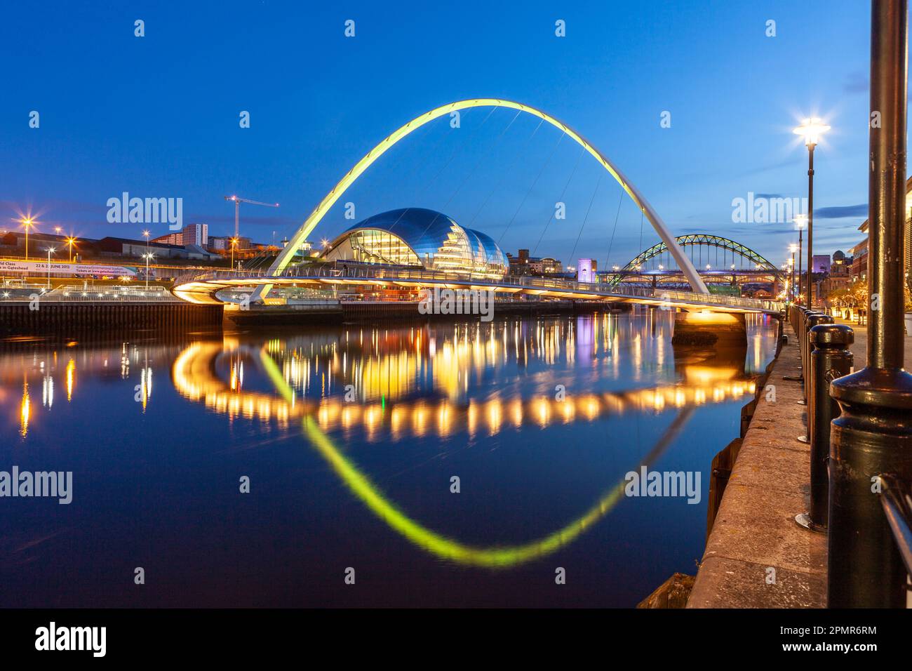 The Gateshead Millennium Bridge and the Sage reflected in River Tyne, Newcastle-Upon-Tyne, Tyne and Wear, England Stock Photo