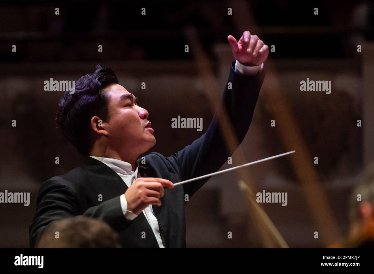 London, Britain. 13th Apr, 2023. Chinese conductor Qian Junping is seen during East Meets West concert in London, Britain, on April 13, 2023. The concert featuring Chinese and Western compositions was held in the Cadogan Hall here on Thursday evening. Credit: Stephen Chung/Xinhua/Alamy Live News Stock Photo