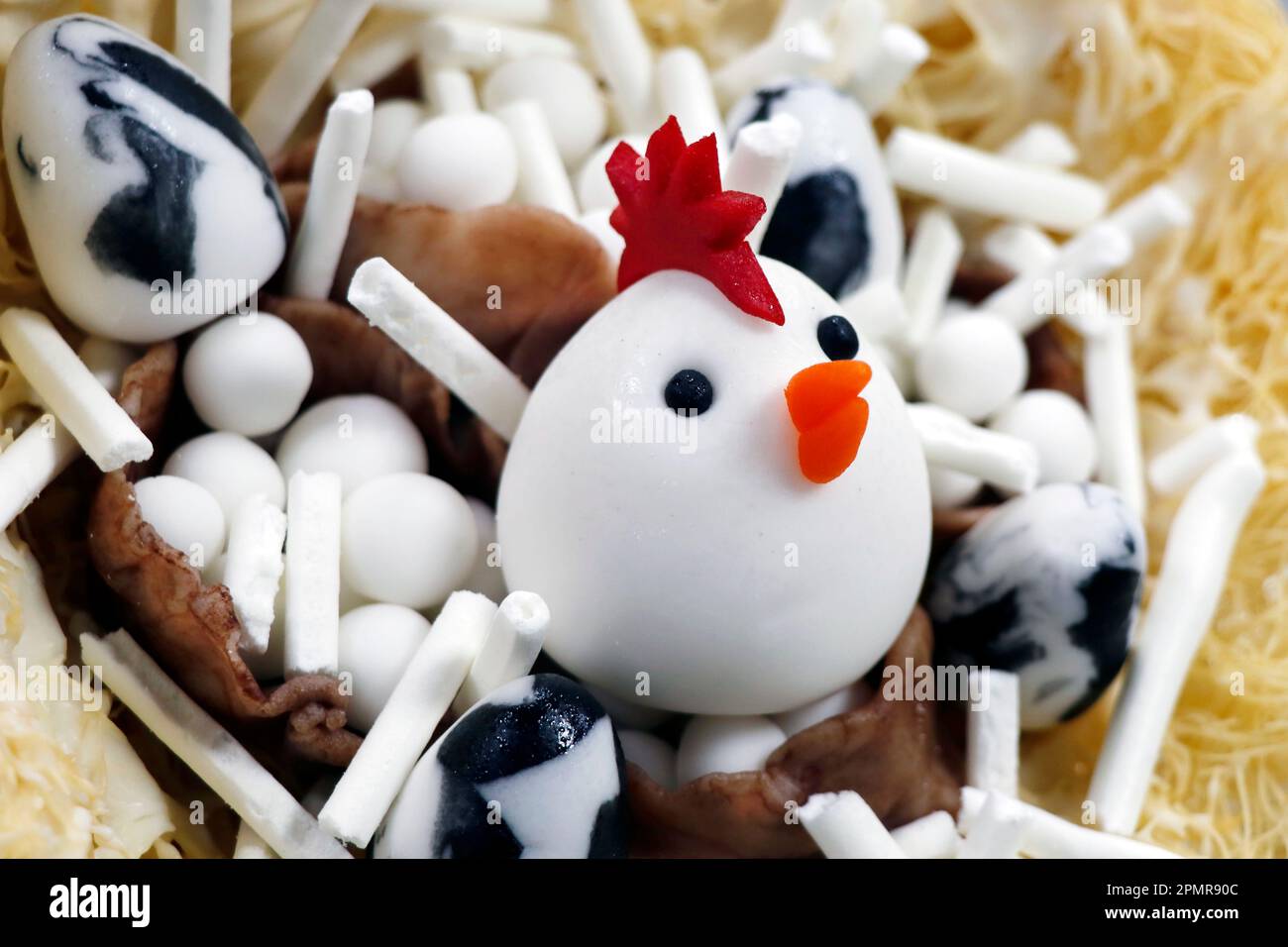 Funny easter marzipan art chicken cake dessert Stock Photo