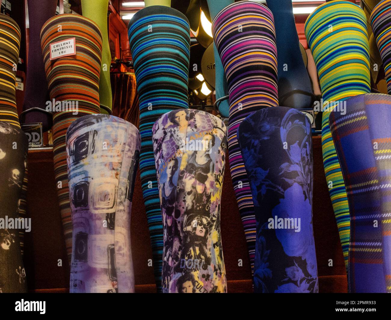 Patterned tights in window of shop on Rue du Bac, Paris Stock Photo - Alamy