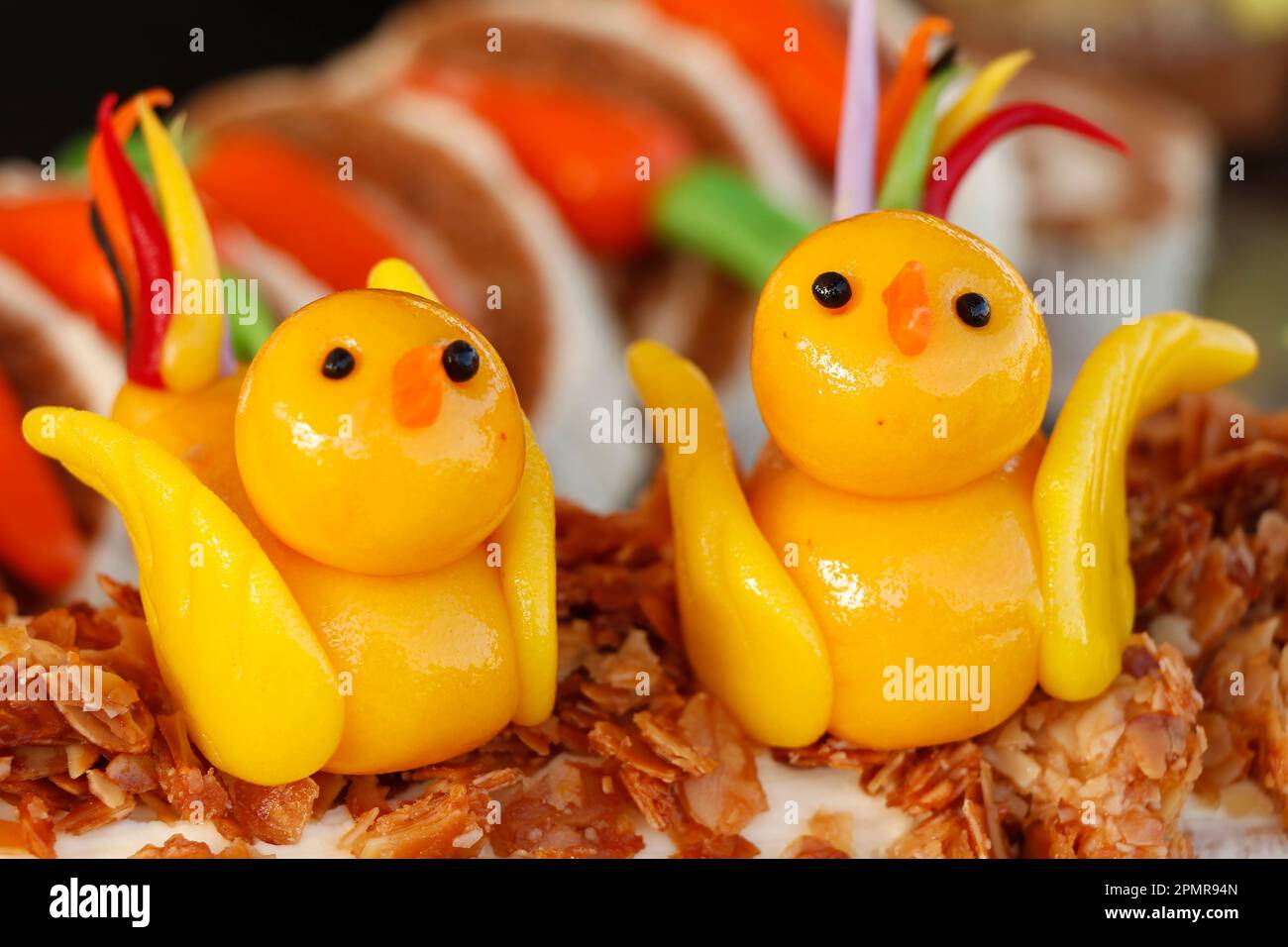 Funny easter marzipan chicken for cake topping Stock Photo