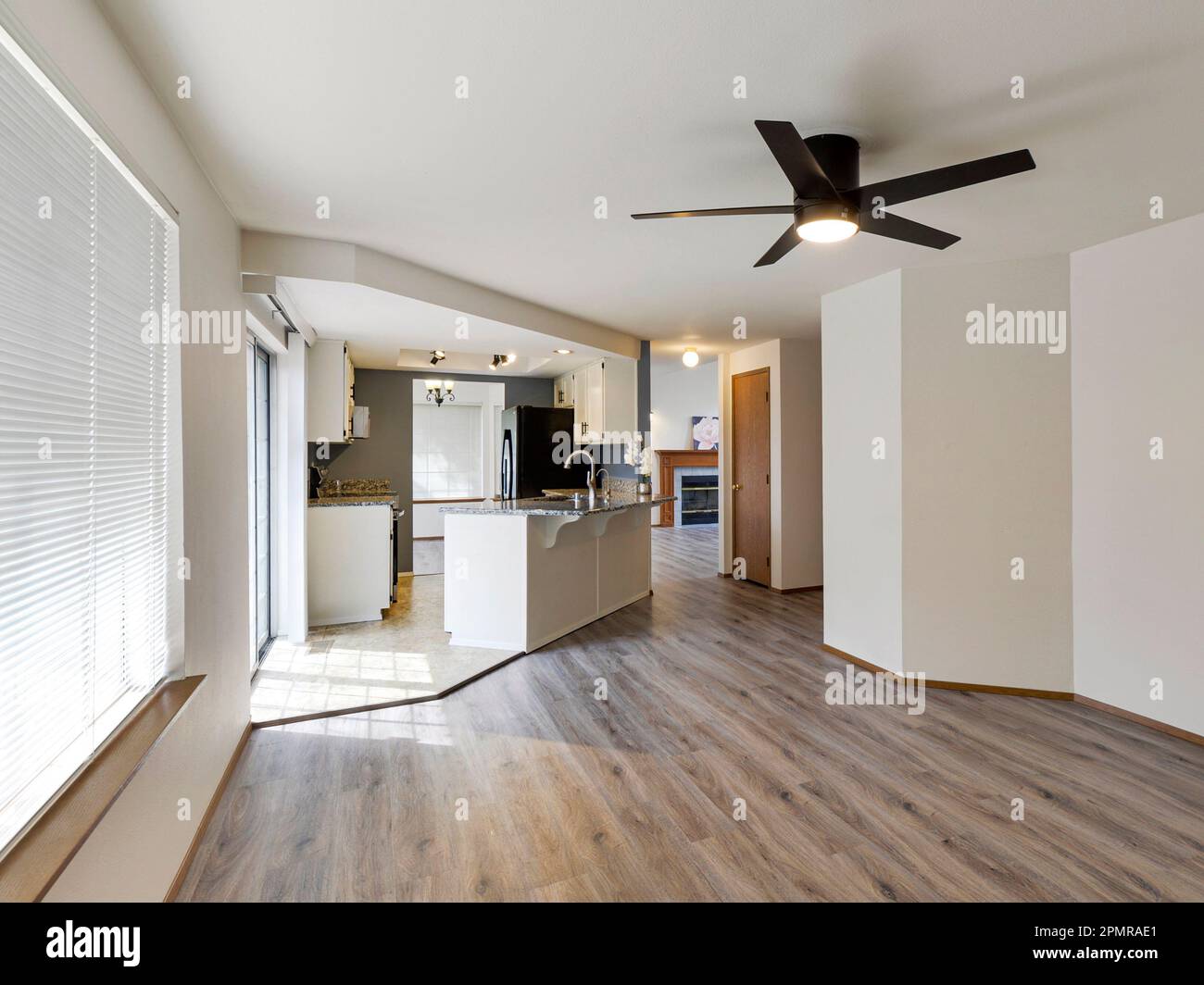 Modern residential kitchen and empty dining room interior Stock Photo ...