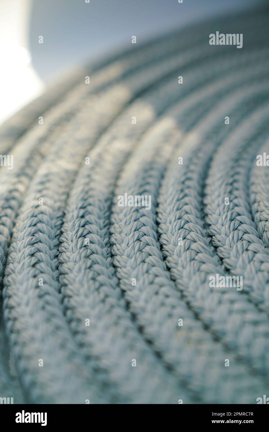close up of nautical sheet and halyard textures rolled up Stock Photo