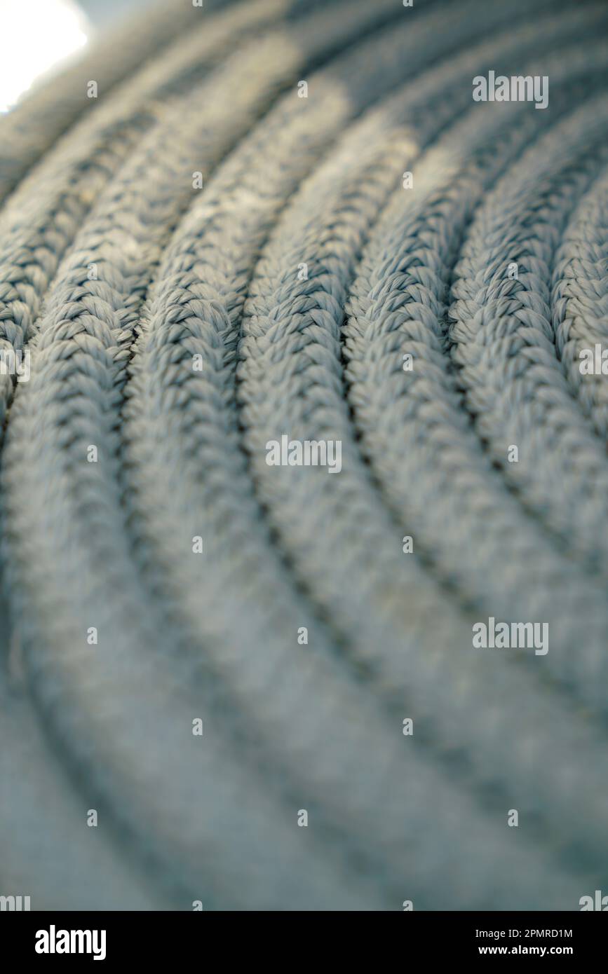 close up of nautical sheet and halyard textures rolled up Stock Photo