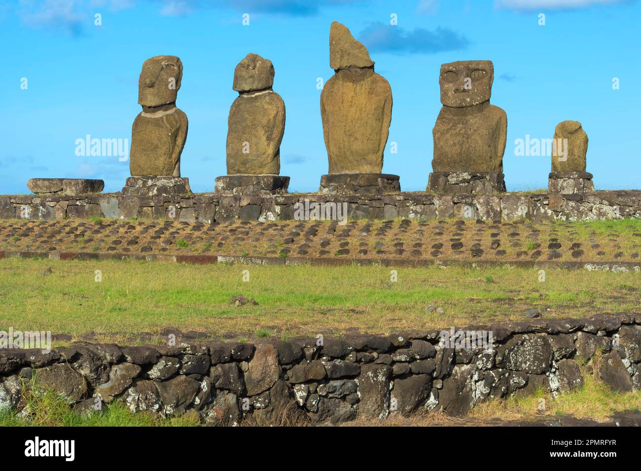 Moais in the Tahai Ceremonial Complex, Hanga Roa, Rapa Nui National Park, Easter Island, Chile, Unesco World Heritage Site Stock Photo