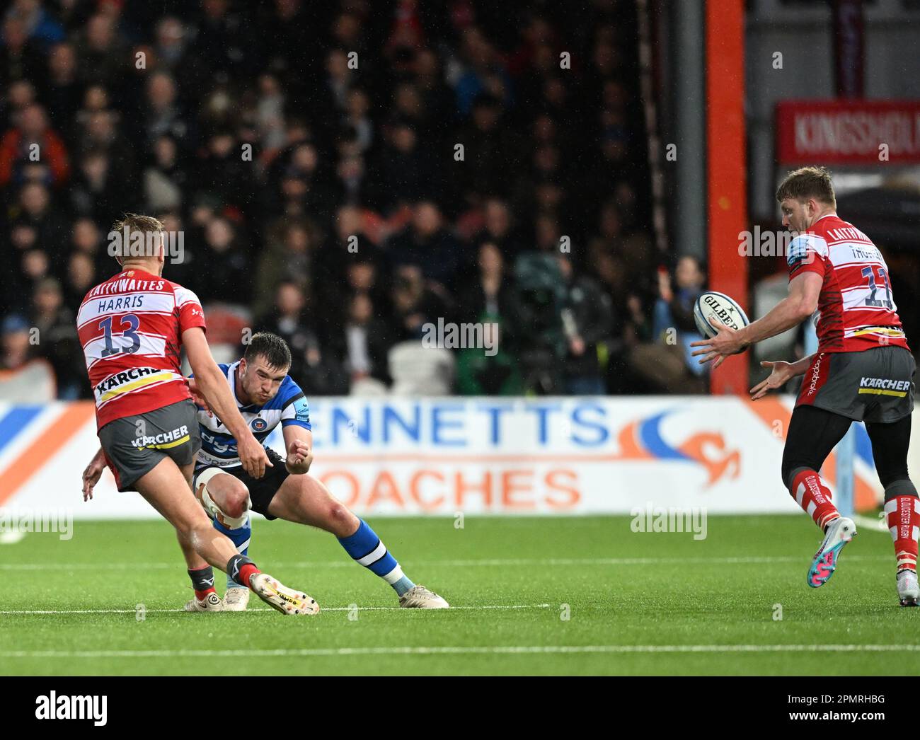 Kingsholm Stadium, Gloucester, Gloucestershire, UK. 14th Apr, 2023. Gallagher Premiership Rugby, Gloucester versus Bath; Chris Harris of Gloucester offloads out of the tackle from Matt Gallagher of Bath Credit: Action Plus Sports/Alamy Live News Stock Photo