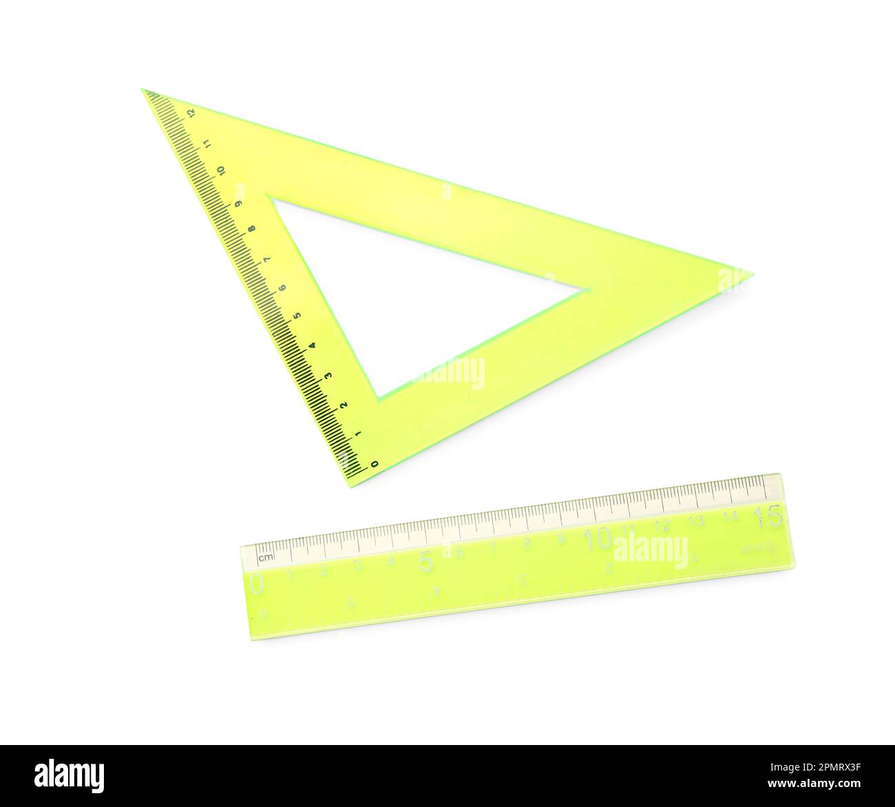 Yellow straight and triangle plastic ruler on white background Stock ...