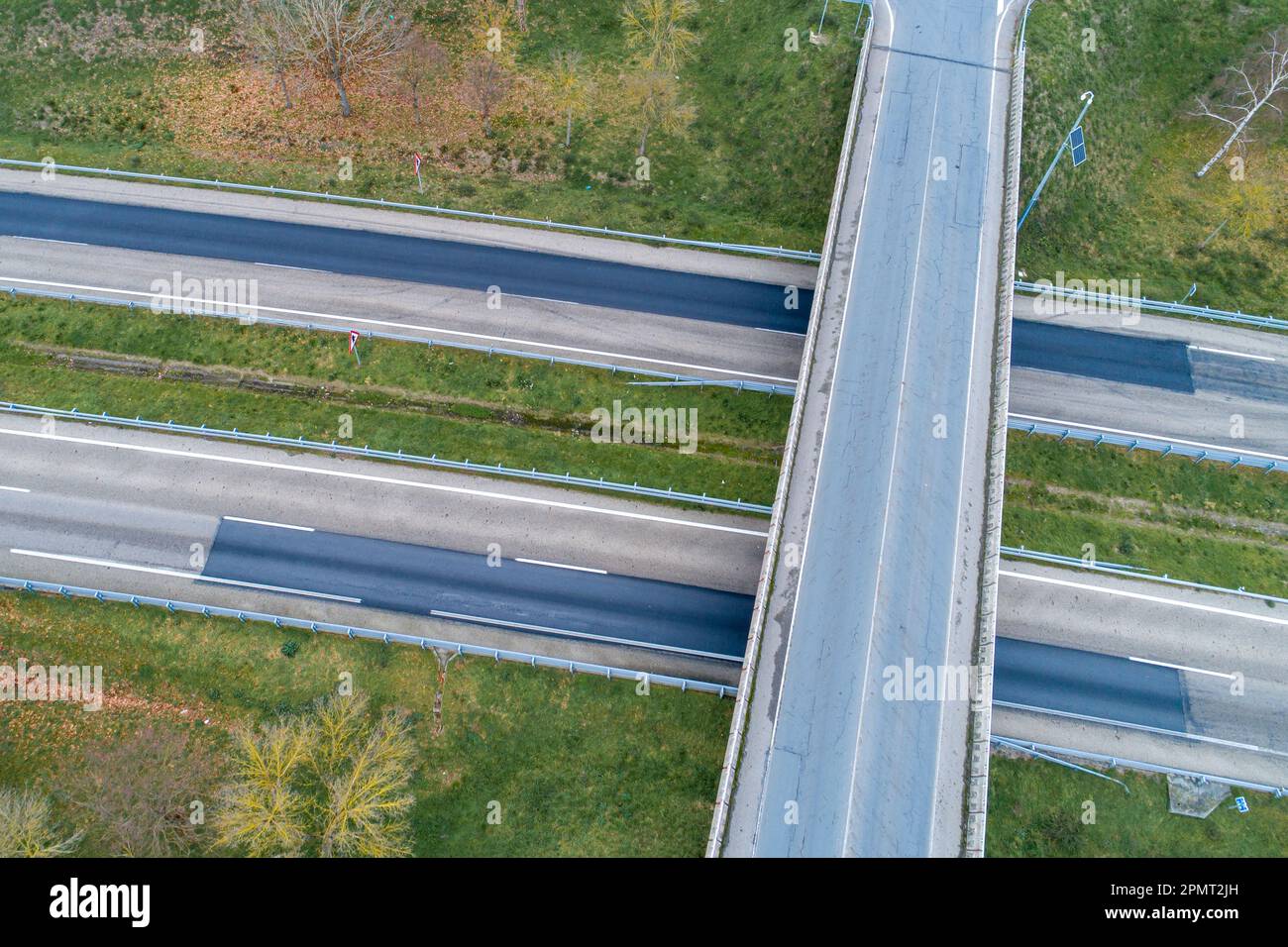 An aerial shot of a rural street intersection with no traffic ...