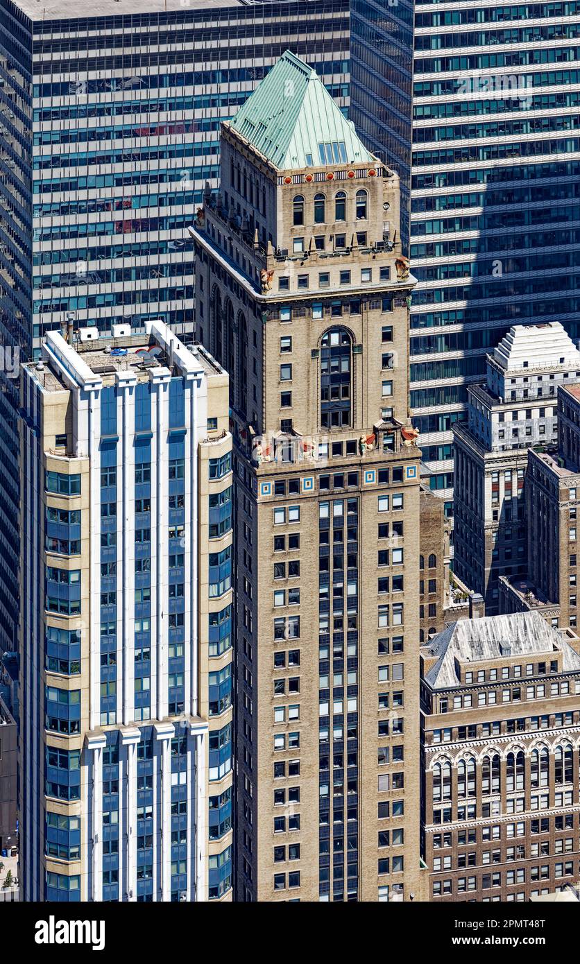 View from above: Colorful terra cotta decoration marks the top of the brick office tower Mercantile Building, 10 East 40th Street. Stock Photo