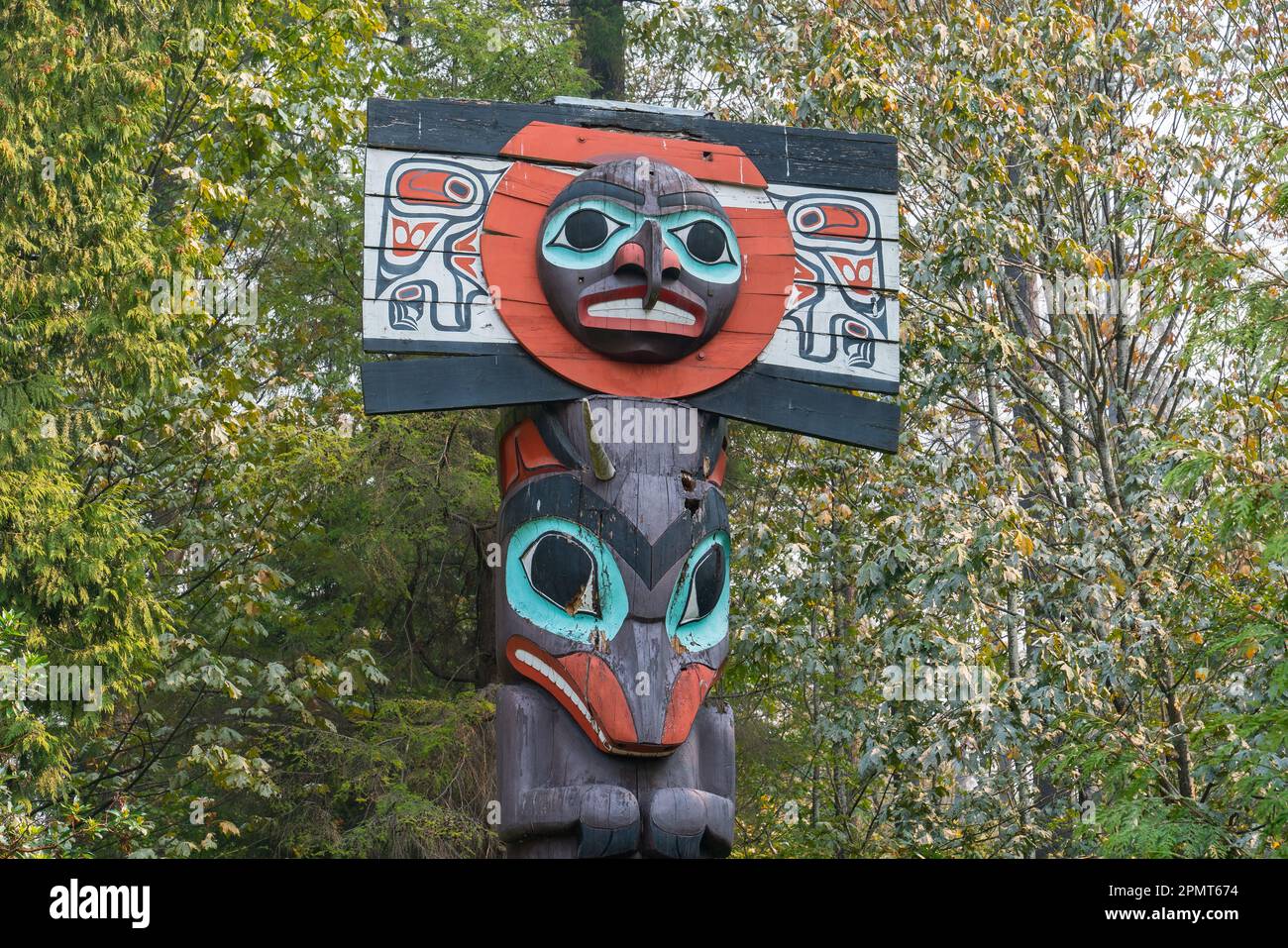 Vancouver, Canada - September 11, 2022: Totem pole in Staley Park is one of many First Nations totem pole on display at the park. Stock Photo