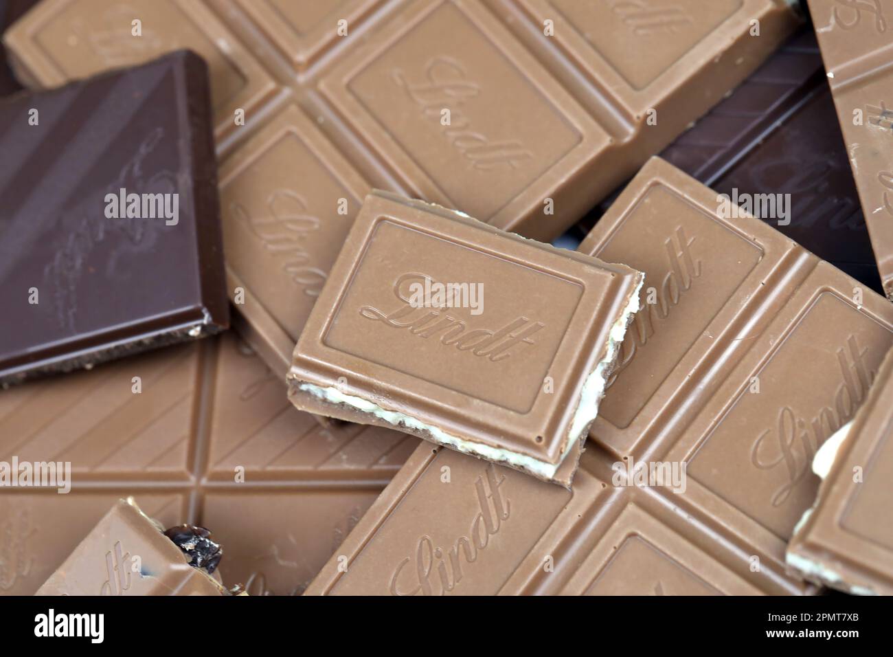 https://c8.alamy.com/comp/2PMT7XB/kyiv-ukraine-may-4-2022-lindt-swiss-luxury-brand-chocolate-brown-tablets-with-embossed-original-company-logo-2PMT7XB.jpg