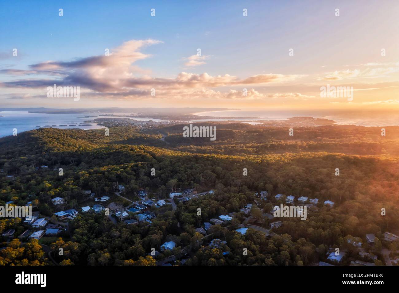 Murrays beach lakeshore town in woods on Pacific coast and Lake