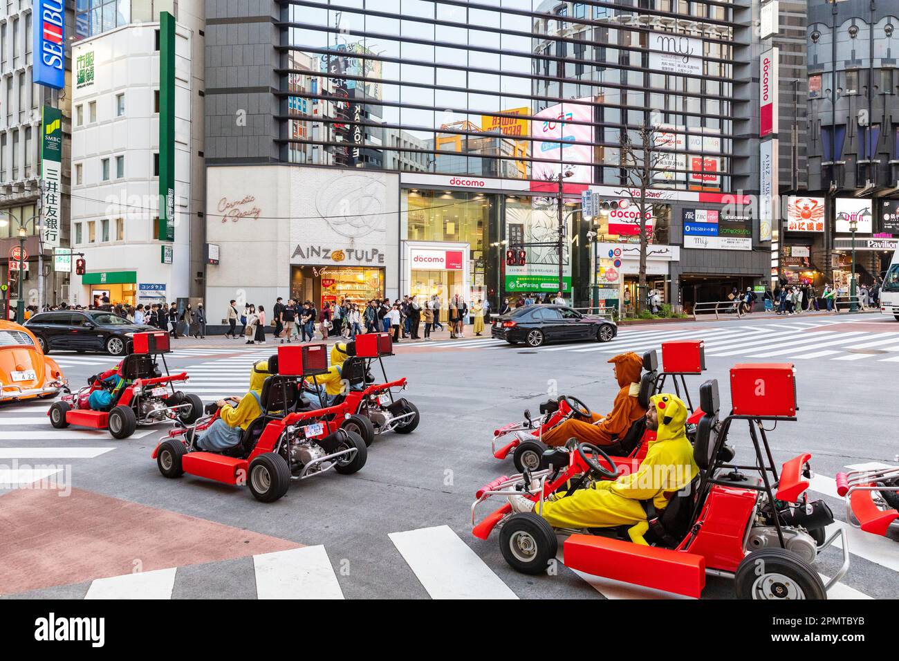 April 2023 Tourists enjoy driving Mario Go-Karts carts on the streets of Tokyo driving through Shibuya ward,Tokyo,Japan,Asia Stock Photo