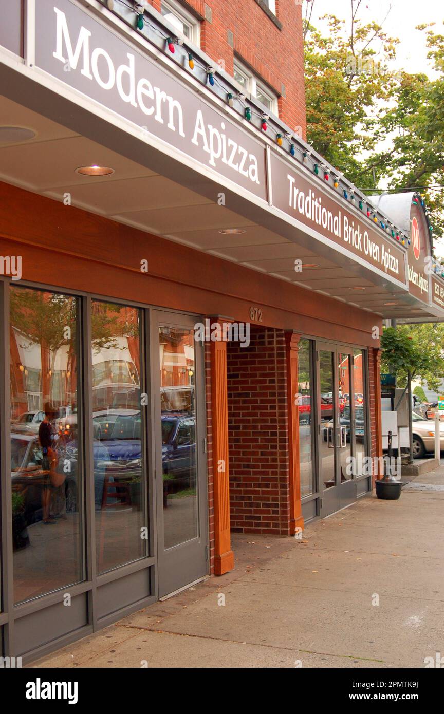 A pizzeria restaurant, named in the more traditional, Modern Apizza, honors the pizza making