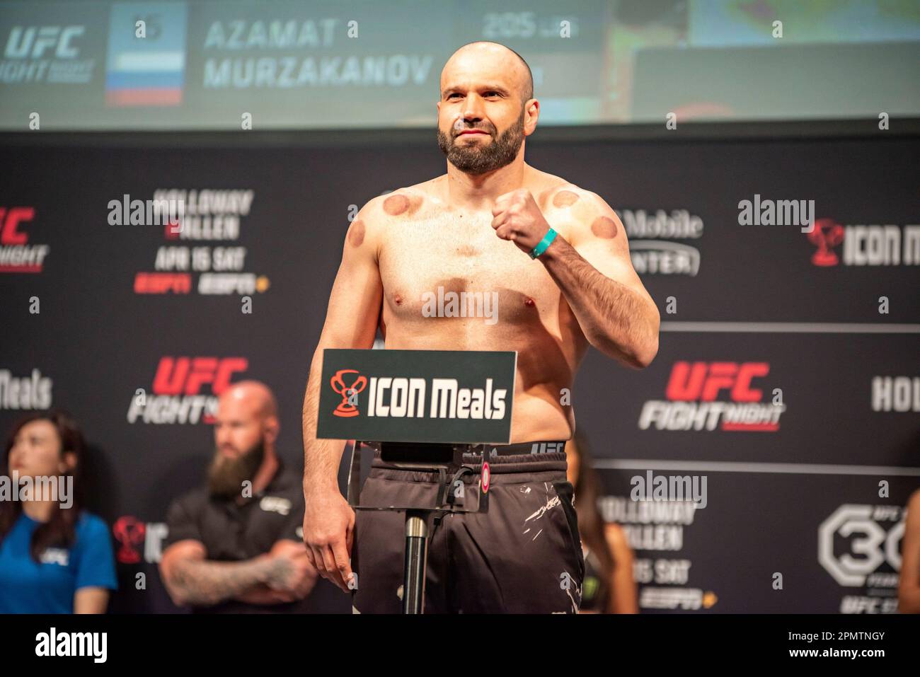 KANSAS CITY, MISSOURI APRIL 14 (LR) Dustin Jacoby and Azamat Murzakanov step on the scales