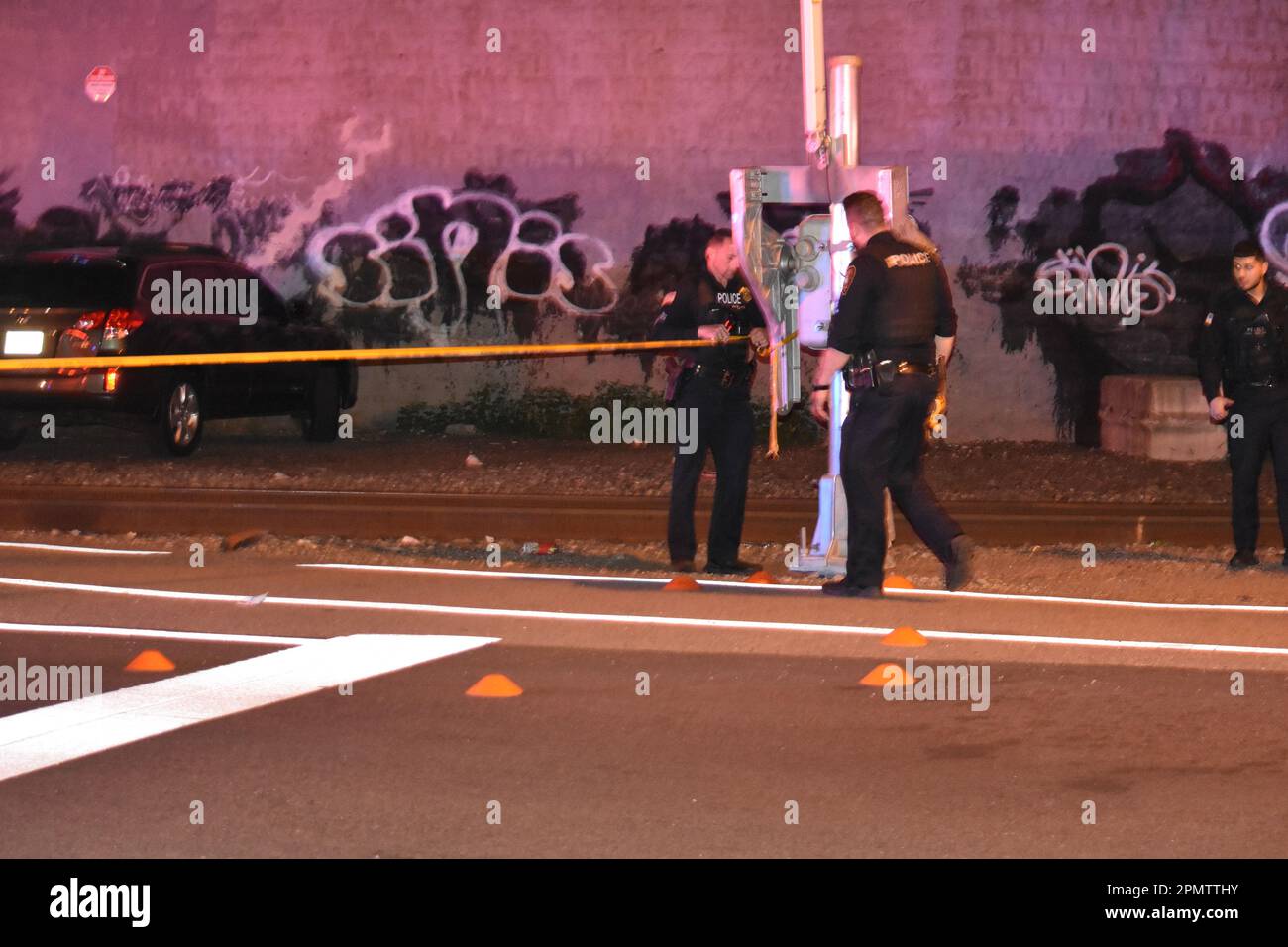 Paterson, USA. 14th Apr, 2023. Evidence markers placed at the crime