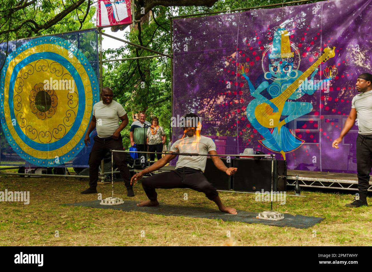 Belfast County Down Northern Ireland, August 28 2022 - Limbo dancers at a local Mela festival in Botanic Gardens Belfast. Stock Photo