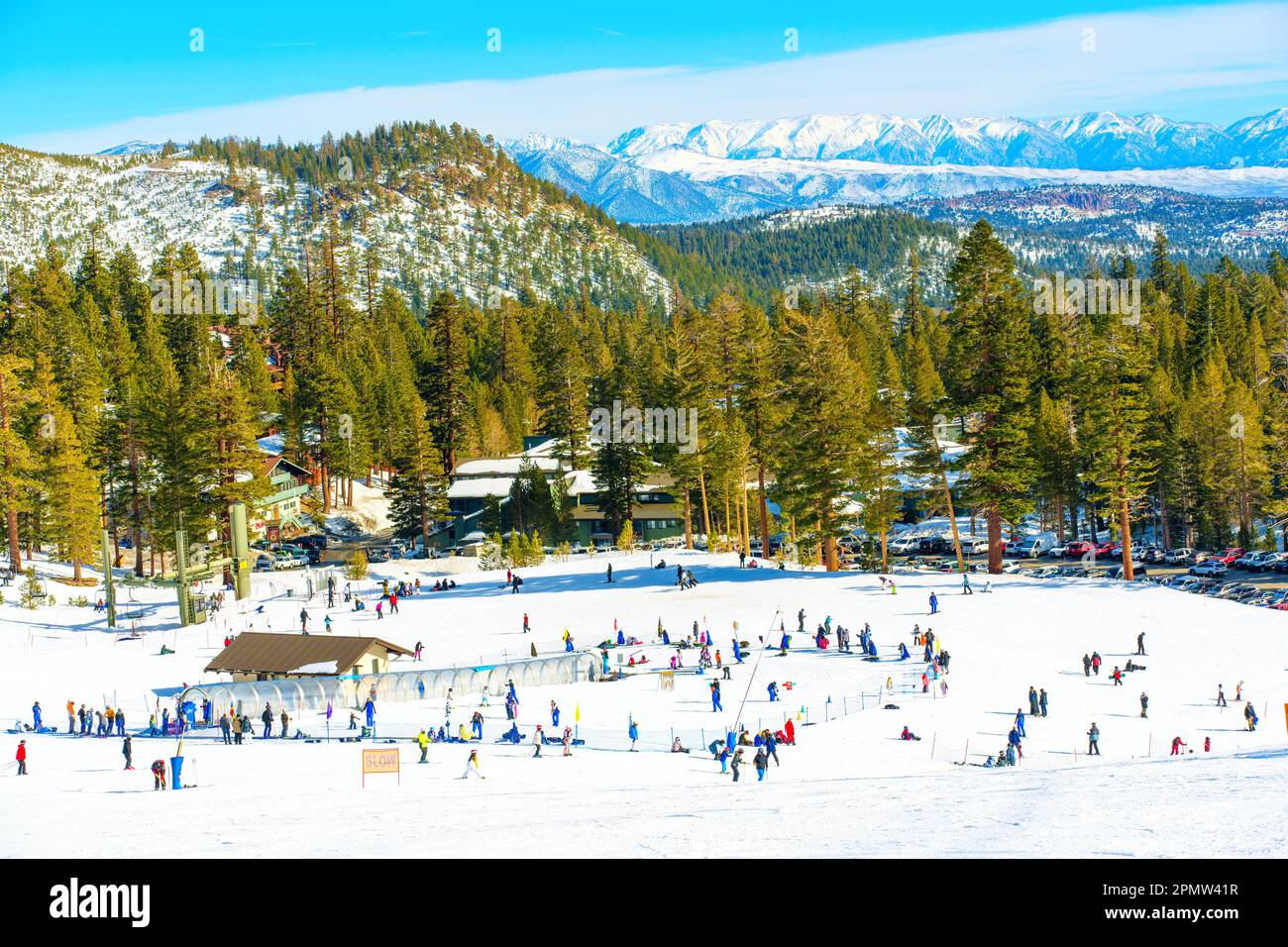 California, USA - December 24, 2022: People Skiing at the Mammoth Mountain Ski Resort Village Stock Photo