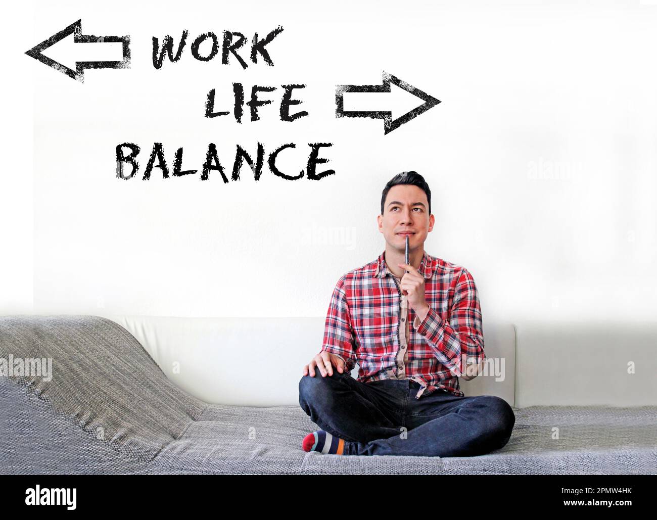 The words work life balance written on a wall, with arrows pointing in ...