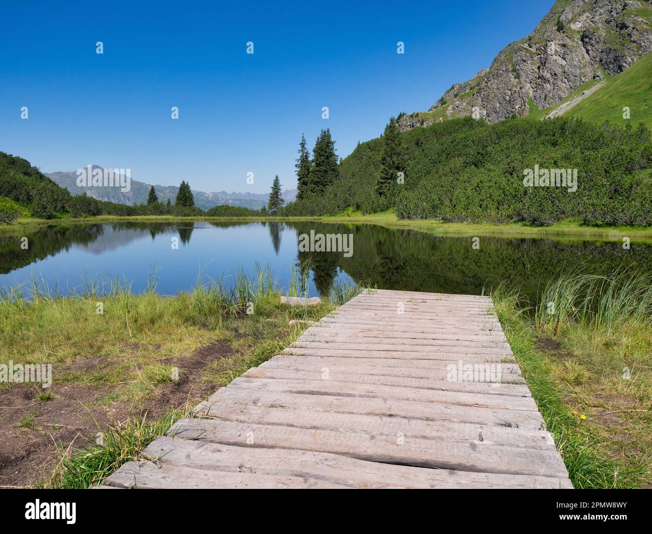 Mountain lake Wiegensee in Gaschurn, Montafon Valley, Vorarlberg, Austria; this lake is distinguished as the most beautiful lake of Austria Stock Photo