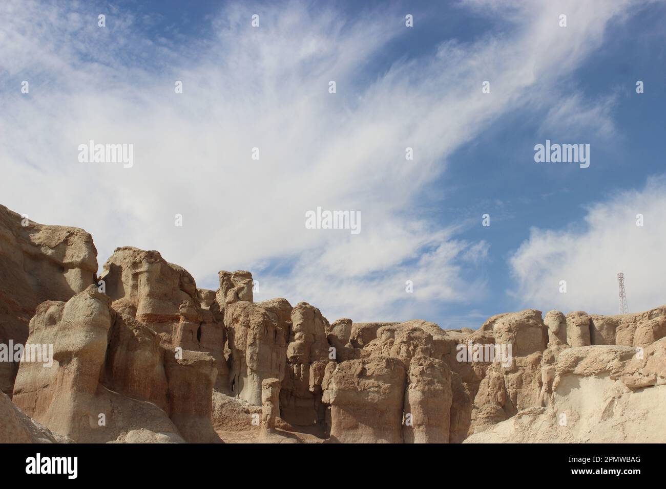 The light brown rock formations against the background of the blue sky. Al-Ahsa, Saudi Arabia. Stock Photo