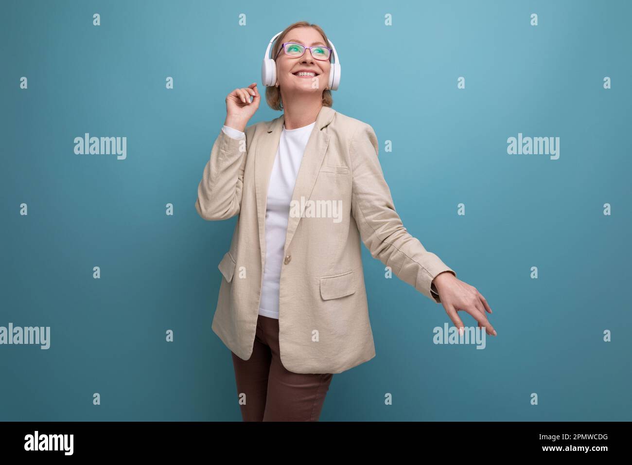 closeup portrait of a 50s middleaged business woman in a jacket
