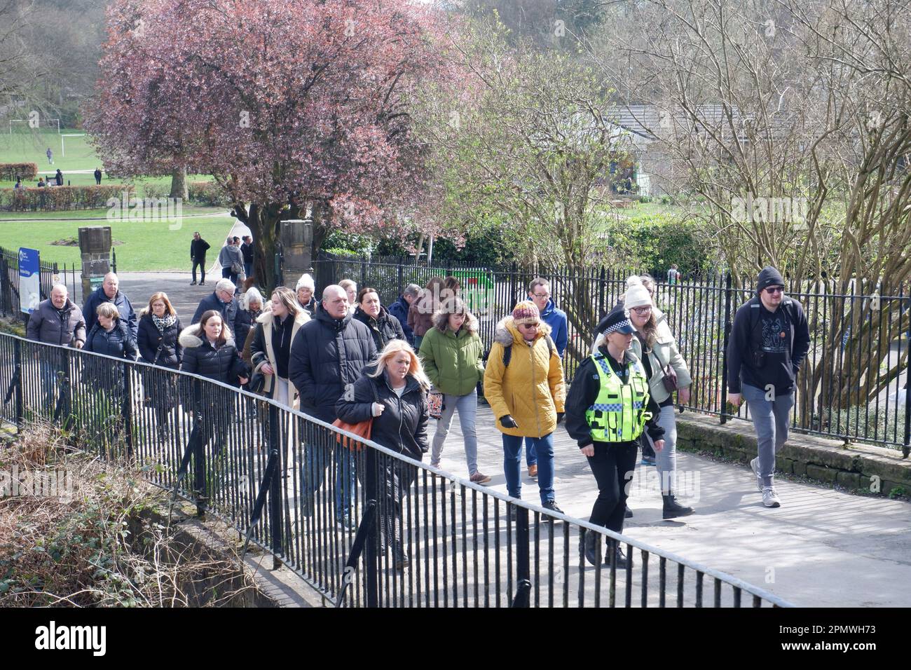 Catherine Cawood-alike in fake policewoman's uniform leading tour of filming locations around the town Hebden Bridge used in the TV show Happy Valley Stock Photo