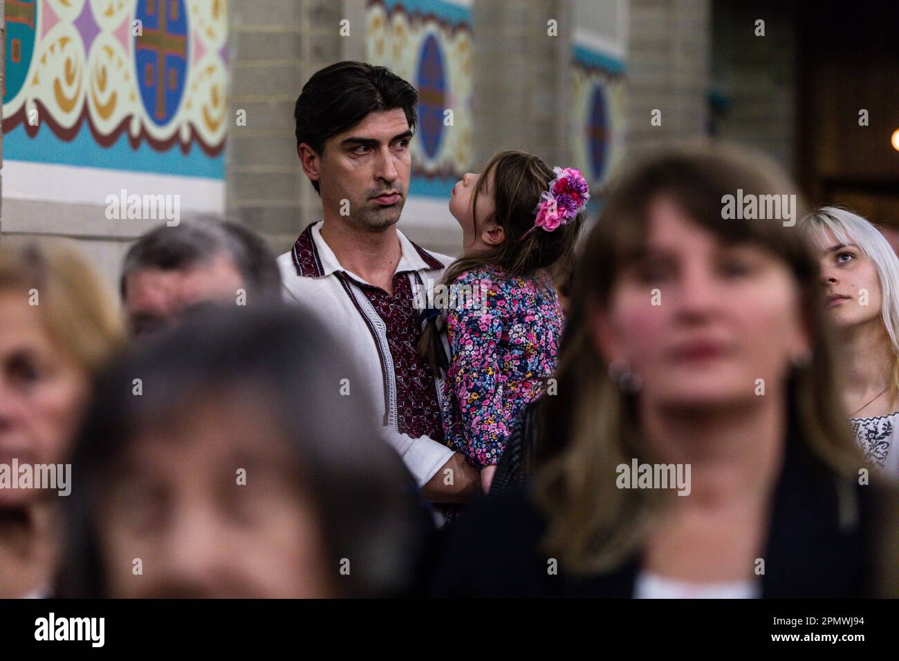 Ukrainian worshippers are seen during a Ukrainian Catholic Easter celebration and food blessing