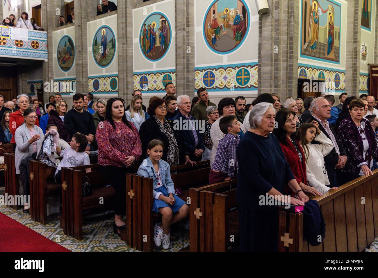 Ukrainian worshippers are seen during a Ukrainian Catholic Easter celebration and food blessing