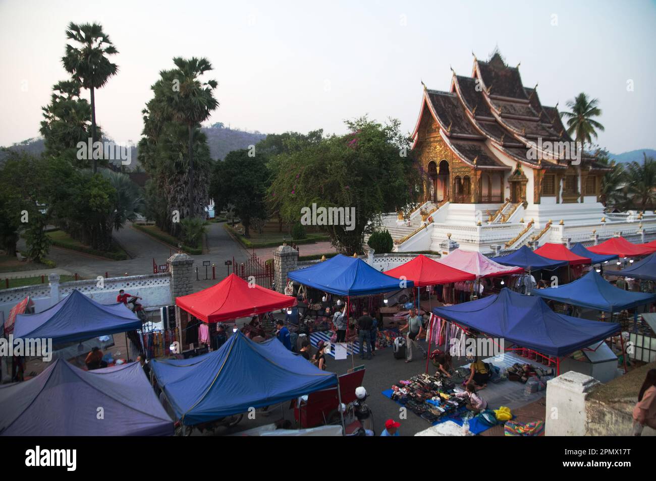 Evening time at Night market is the palace in the background. It is a famous tourist spot. Popular tourist attraction sell a lot of souvenirs. Stock Photo