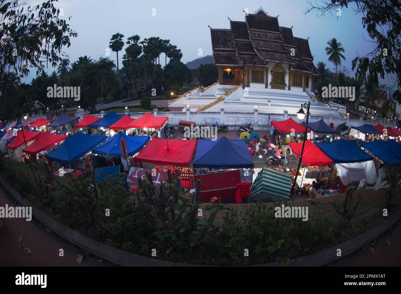 Evening time at Night market is the palace in the background. It is a famous tourist spot. Popular tourist attraction sell a lot of souvenirs. Stock Photo