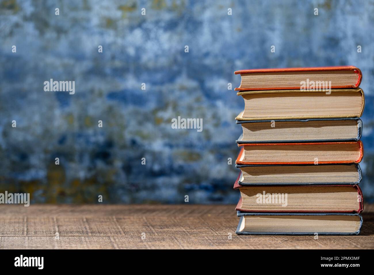 Closeup book stack in the library room and bookshelf for business and ...