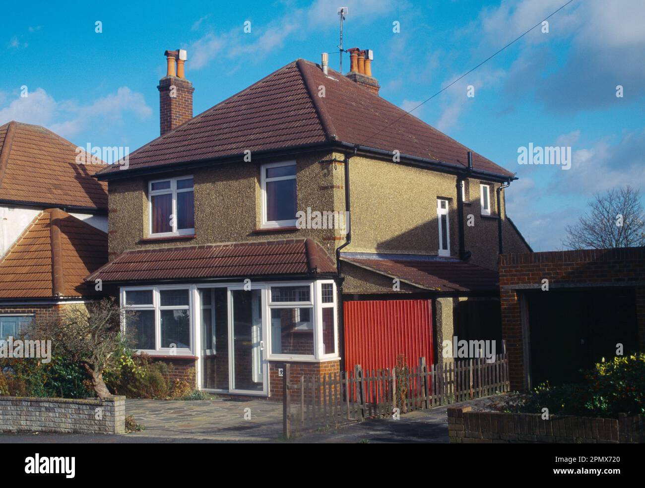 Pebbledash Detached House with Double Glazing Surrey England Stock Photo