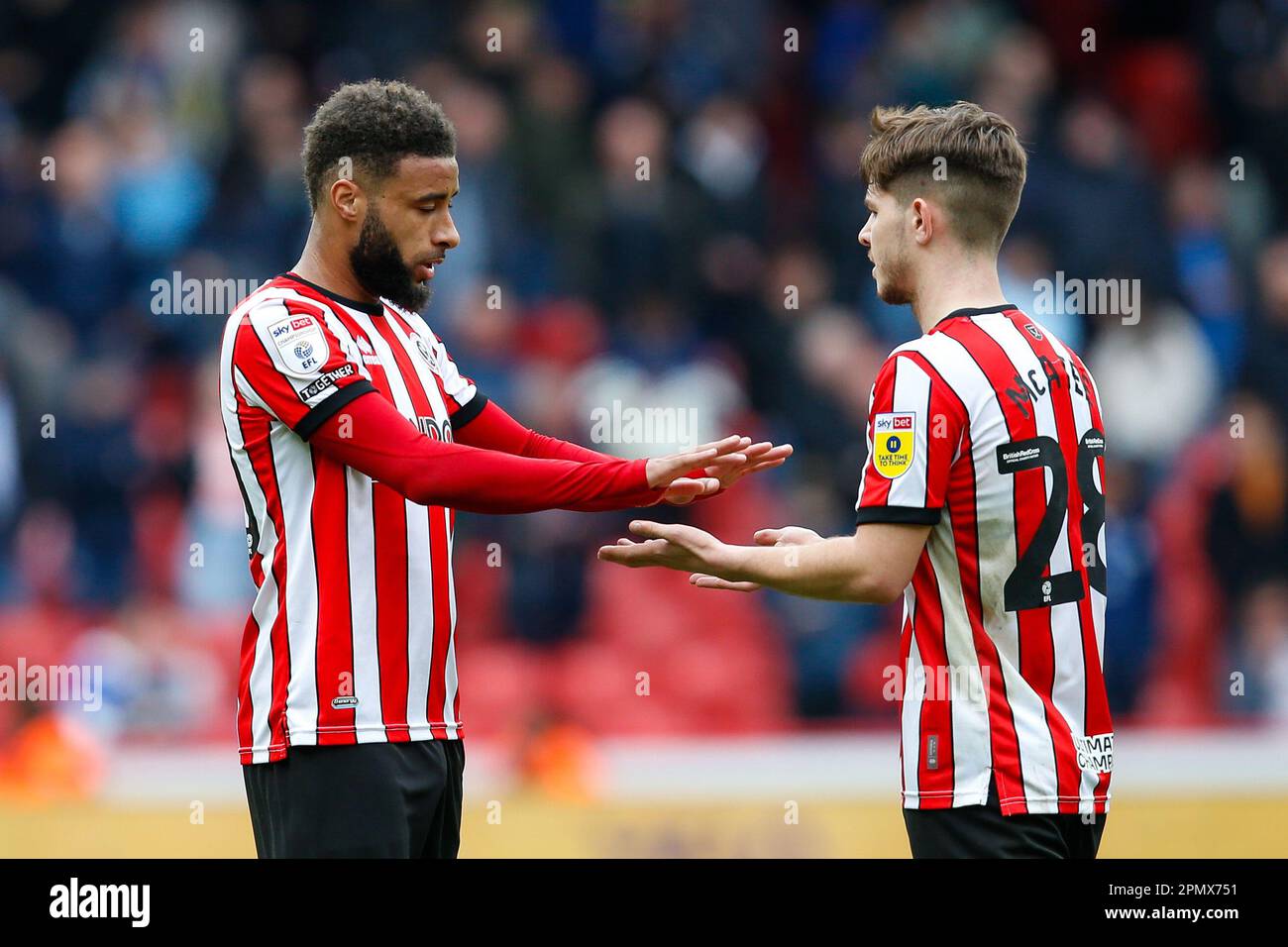 Jayden Bogle #20 of Sheffield United and James McAtee #28 of Sheffield United during the Sky Bet Championship match Sheffield United vs Cardiff City at Bramall Lane, Sheffield, United Kingdom, 15th April 2023  (Photo by Ben Early/News Images) Stock Photo