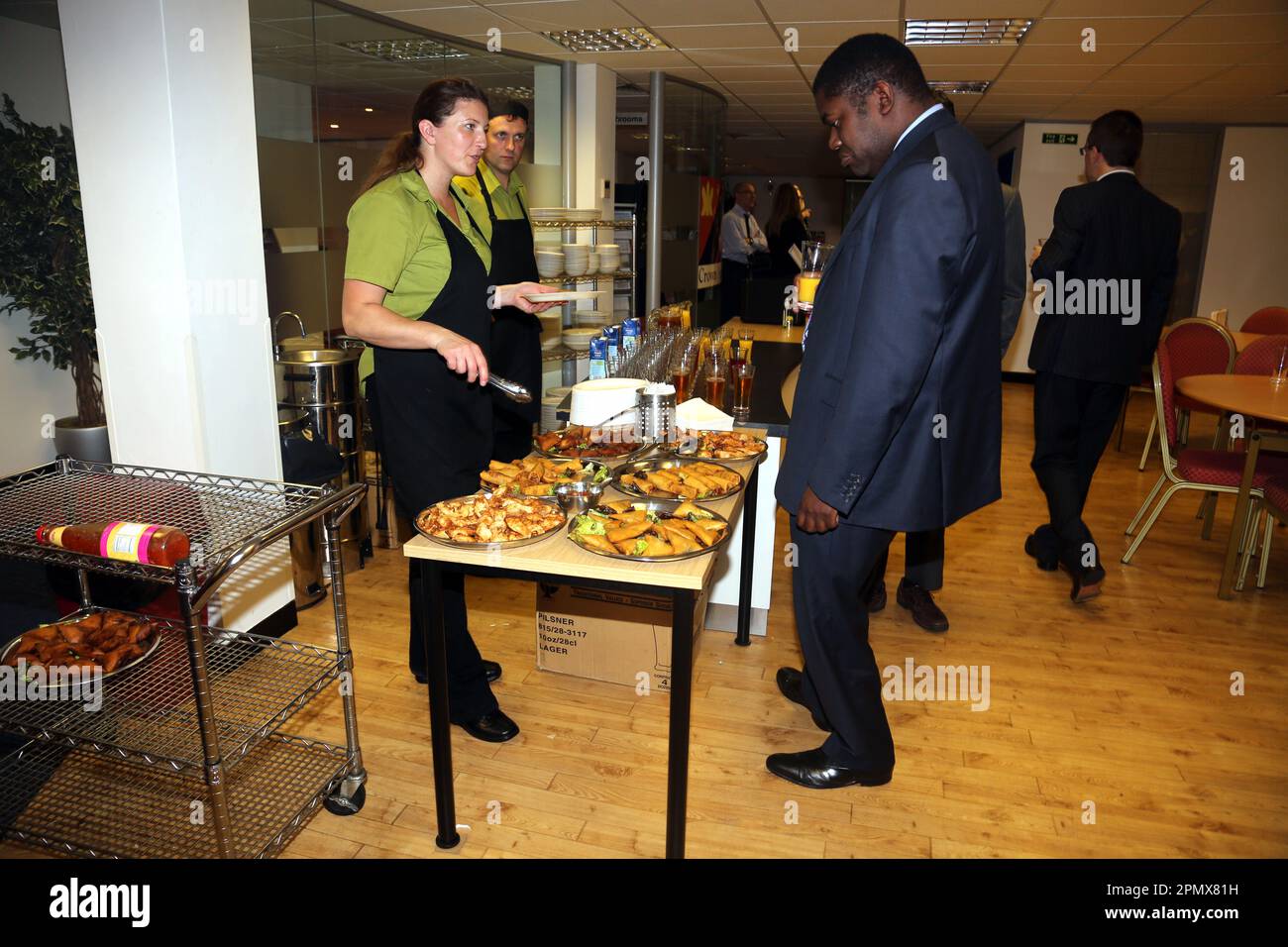 Businessmen by Buffet Lunch at Business Conference England Stock Photo