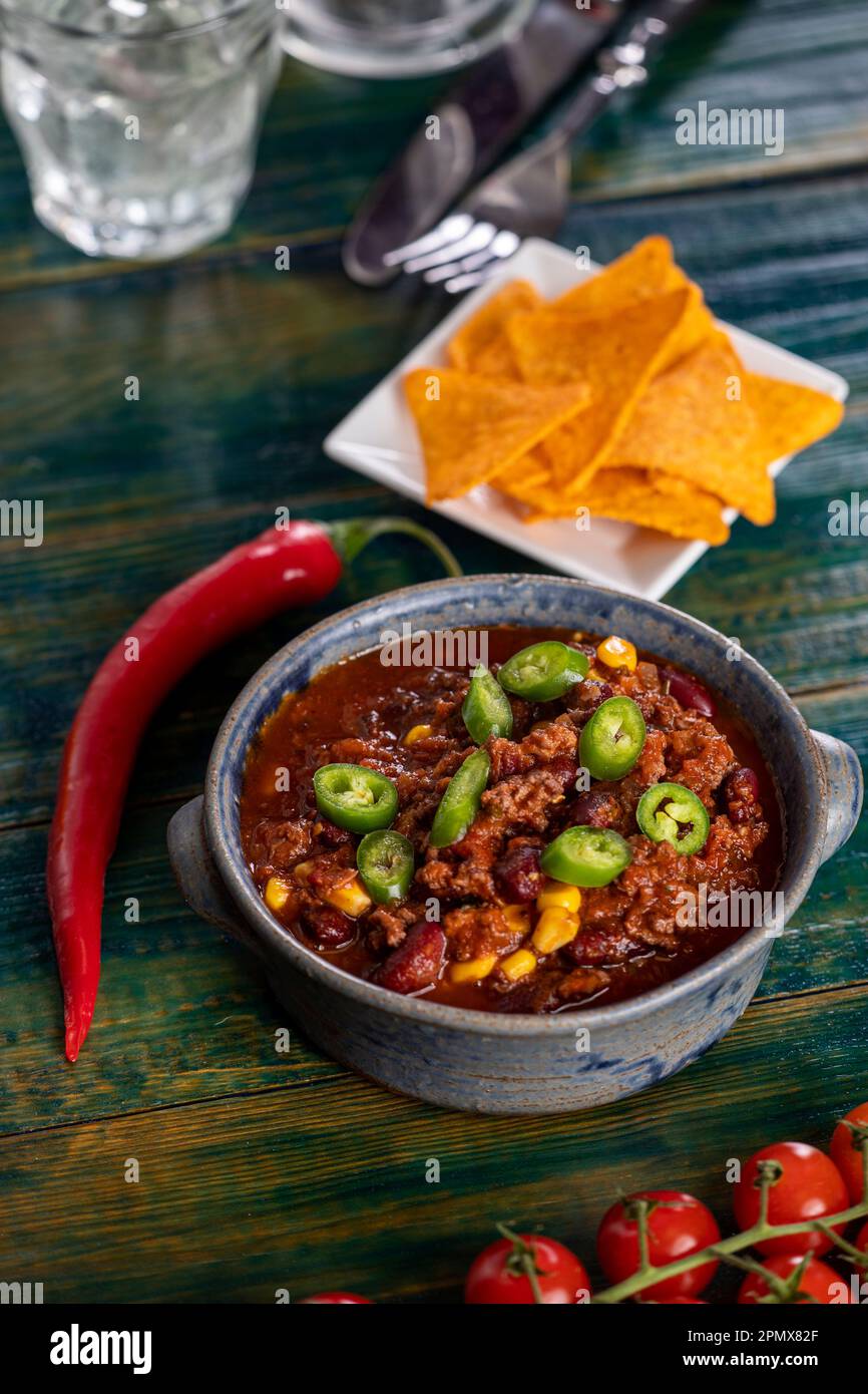 chili con carne with nachos Stock Photo