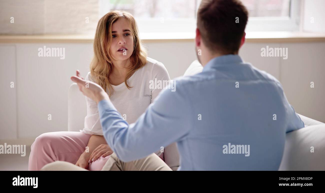 Sad Man Arguing With Woman. Couple Family Divorce Stock Photo