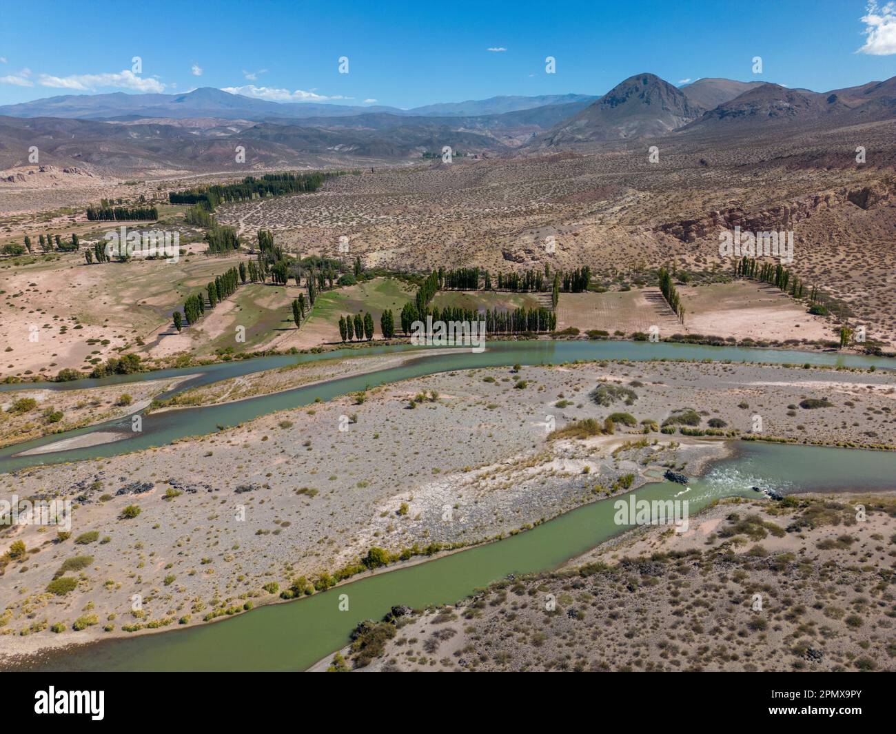 Aerial view of the remote and scenic nature with branches of the river Rio Grande along the famous Ruta40 in Mendoza Province in Argentina Stock Photo