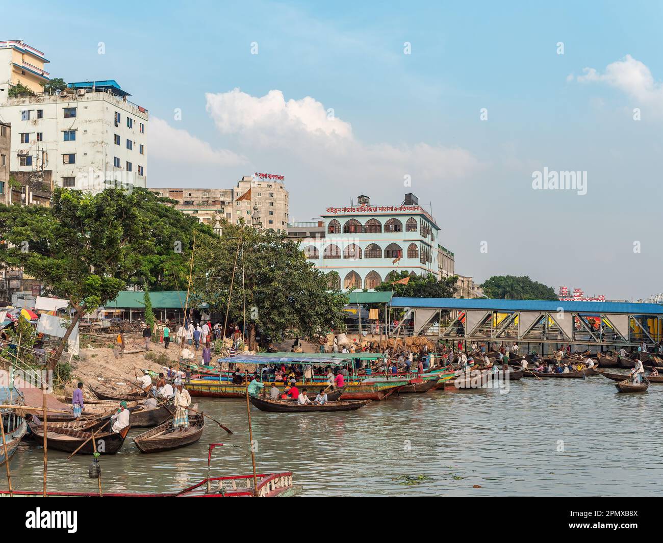Local ferries at Wise Ghat Boat Station on Buriganga River in Dhaka, the capital of Bangladesh. Stock Photo