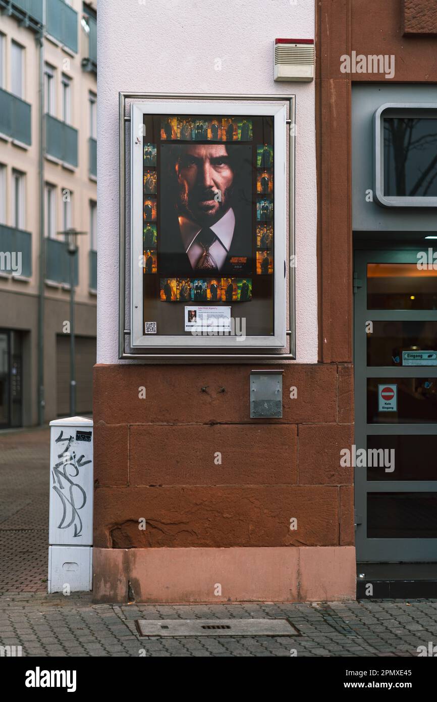 John Wick blockbuster movie poster outside of cinema theatre in Kaiserslautern, Germany Stock Photo