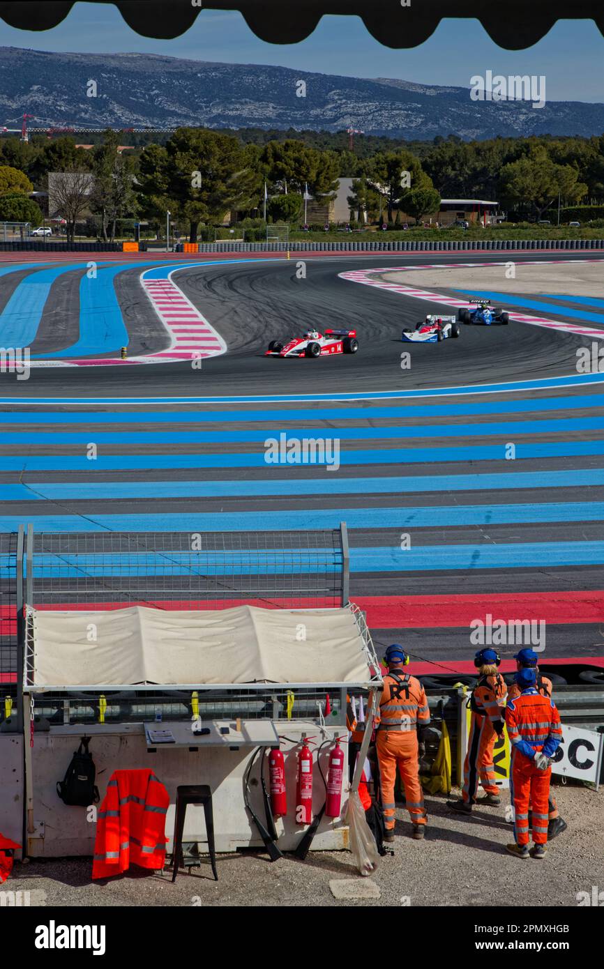 LE CASTELLET, FRANCE, April 9, 2023 : Marshalls on the track during the fifth French Historic Grand Prix on Circuit Paul Ricard Stock Photo