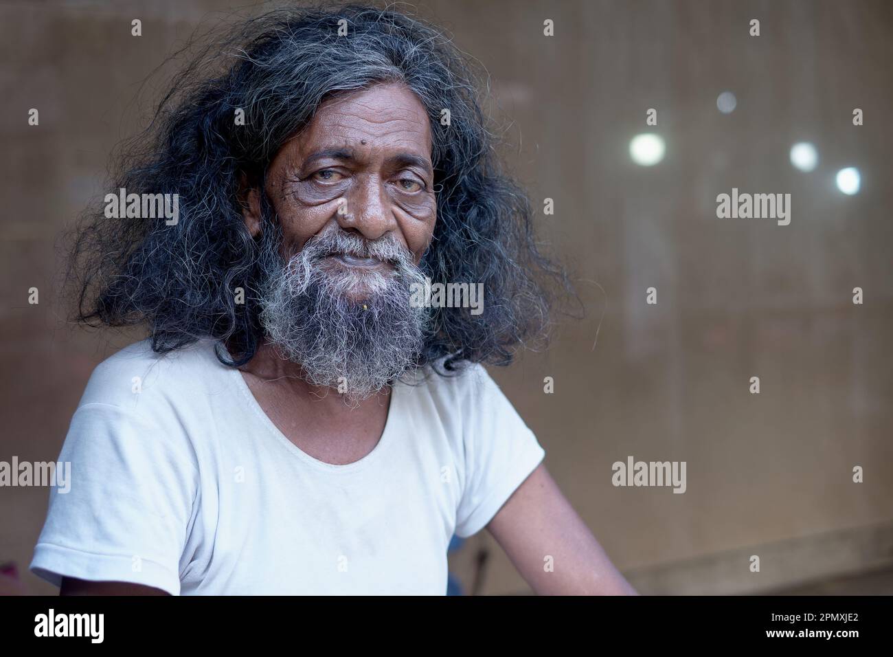 A long-haired fakir-type character, a Muslim man living on the fringe ...