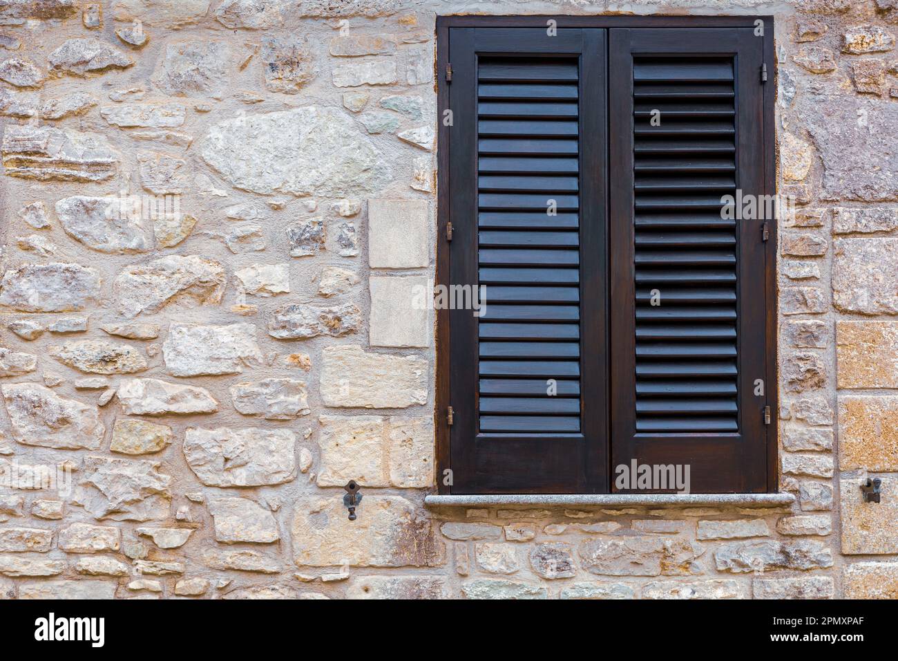 The ancient window on stone wall, for background Stock Photo - Alamy