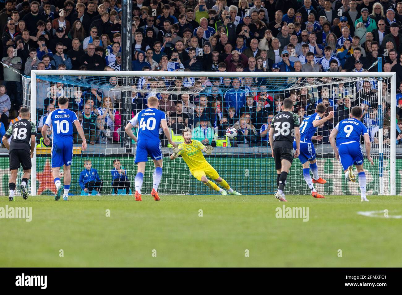 Antony Evans #21 of Bristol Rovers scores penalty in injury time to equalise during the Sky Bet League 1 match Bristol Rovers vs Derby County at Memorial Stadium, Bristol, United Kingdom, 15th April 2023  (Photo by Craig Anthony/News Images) Stock Photo